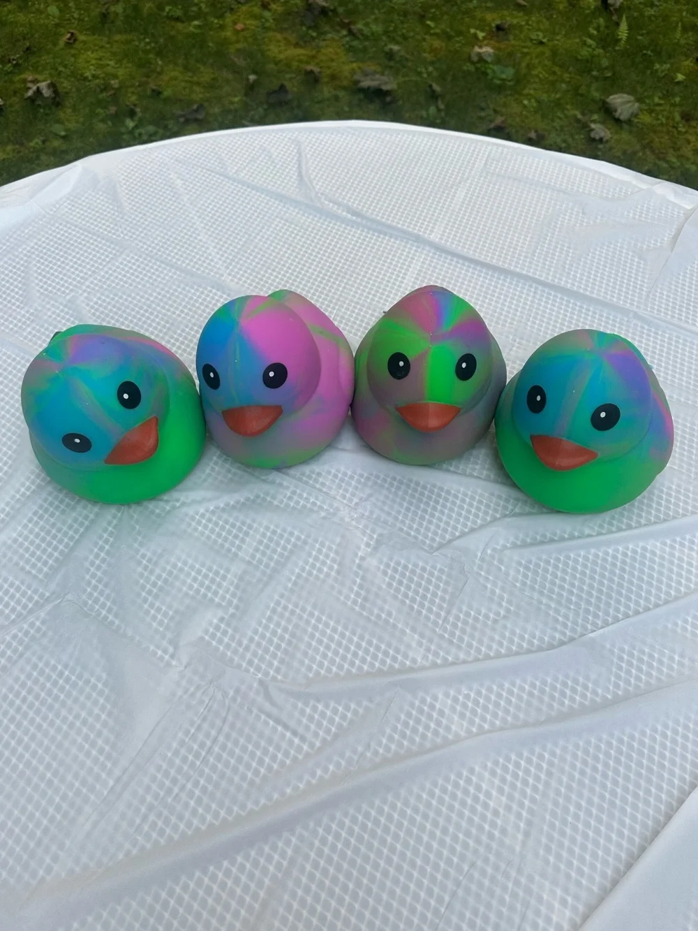 ONE Sunny Days Squeeezy tiedye duck jumbo squishy squeezy fidget toy multicolor